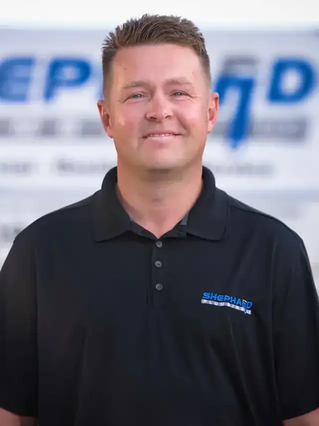 Jeremy Shephard, owner of Shephard Plumbing, in a black company polo